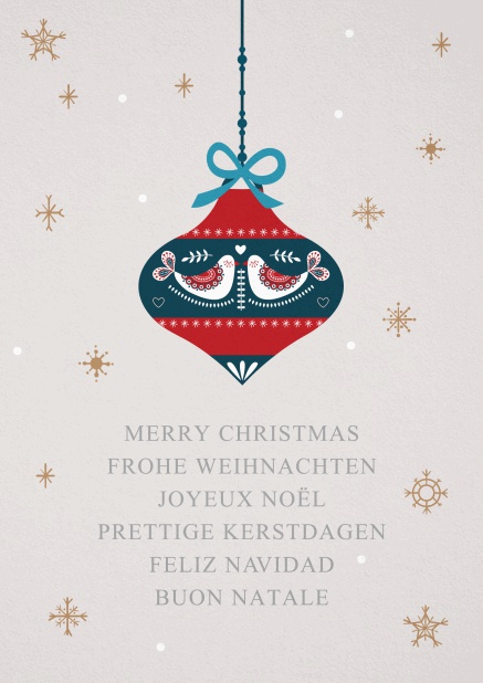 Weihnachtskarte mit Weihnachtskugel in rot und blau.