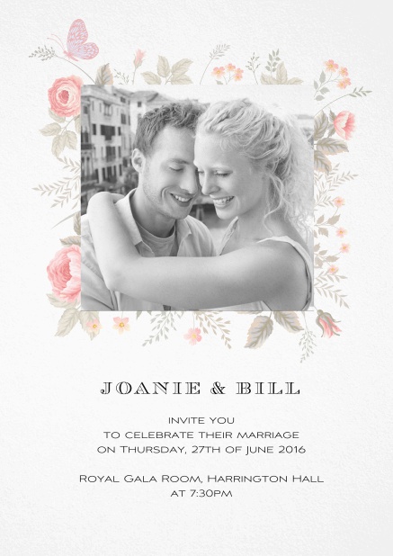 Wedding invitation card with photo and delicate flower decoration.