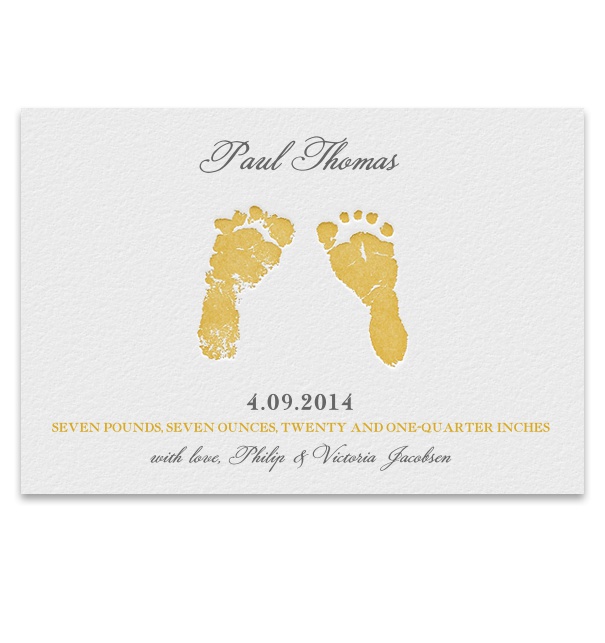 Online birth annoucement with little golden foot prints.