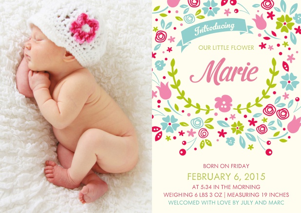 Birth announcement card with photo left and flower design for text right.