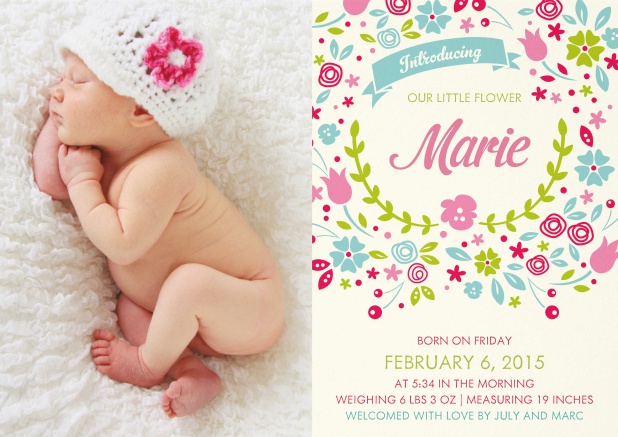 Birth announcement card with photo left and flower design for text right.