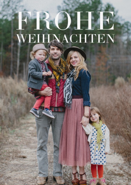 Weihnachtskarte mit vorne Foto und Frohe Weihnachten Text und mehreren Fotooptionen auf den weiteren Seiten.