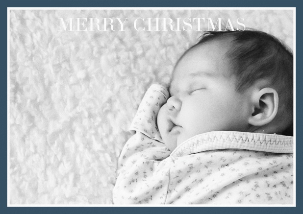 Christmas photo card with text on photo field and blue frame.