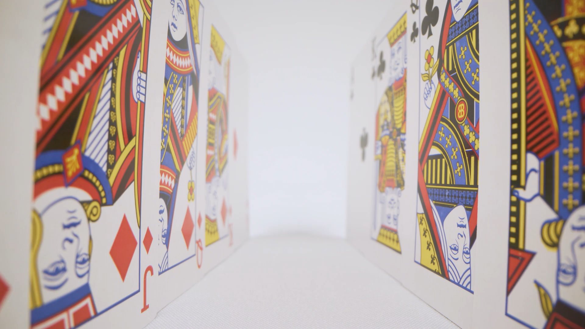 Video of playing cards entering into view like a tunnel
