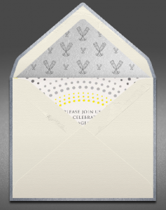 Creme envelope with silver lining opened 